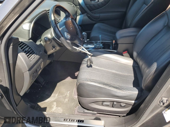 2014 Infiniti QX70 with VIN JN8CS1MU1EM451534, listed as a Copart auction lot 52677335 with 118,862 mi miles and Salvage Title. Bid and sale history available at DreamBid. Image 7.