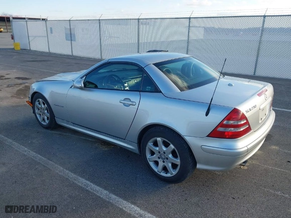 2001 Mercedes-Benz SLK-Class Kompressor with VIN WDBKK49F71F187400, listed as a IAAI auction lot 41234092 with 168,219 mi miles. Bid and sale history available at carsss.com. Image 3.