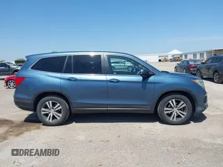 2016 Honda Pilot EX-L z VIN 5FNYF5H57GB029702, wystawiony jako IAAI lot #41995829 z przebiegiem 226 949 mil mil oraz . Historia ofert i sprzedaży dostępna na DreamBid. Obrazek 13.
