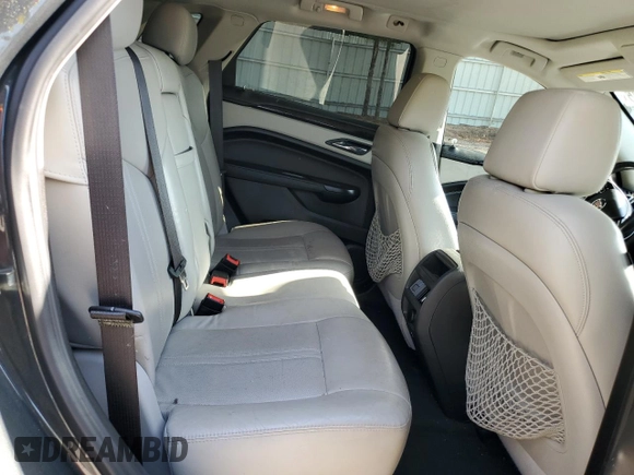 2016 Cadillac SRX Performance Collection z VIN 3GYFNCE30GS572828, wystawiony jako Copart lot #55176485 z przebiegiem 108 767 mil mil oraz Szkoda całkowita • Salvage title. Historia ofert i sprzedaży dostępna na DreamBid. Obrazek 10.
