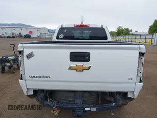2016 Chevrolet Colorado 4WD LT z VIN 1GCGTCE34G1314152, wystawiony jako IAAI lot #42328625 z przebiegiem 129 517 mil mil oraz . Historia ofert i sprzedaży dostępna na DreamBid. Obrazek 17.