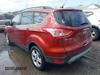 2016 Ford Escape SE with VIN 1FMCU9GXXGUB02932, listed as a IAAI auction lot 41797351 with 74,284 mi miles. Bid and sale history available at carsss.com. Image 3.