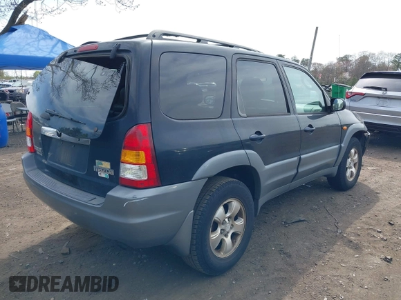 2002 Mazda Tribute LX with VIN 4F2YU08152KM63439, listed as a IAAI auction lot 42108181 with 146,428 mi miles and . Bid and sale history available at carsss.com. Image 4.