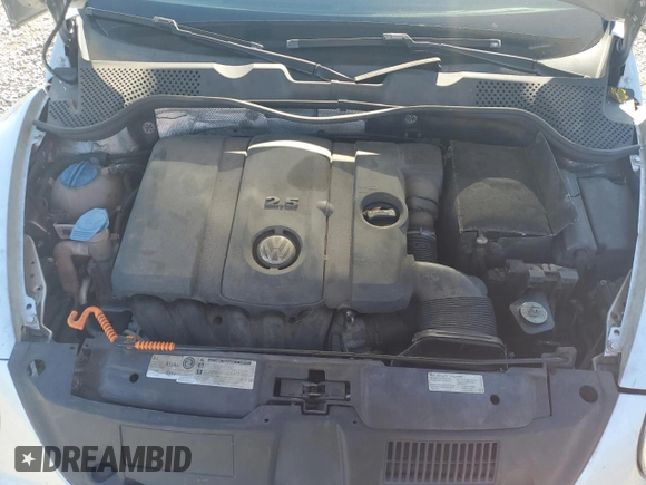 2013 Volkswagen Beetle 2.5L with VIN 3VW5P7ATXDM803952, listed as a Copart auction lot 76971934 with 211,449 mi miles and Salvage Title. Bid and sale history available at DreamBid. Image 11.