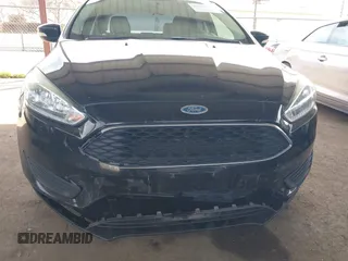 2015 Ford Focus SE with VIN 1FADP3F25FL330463, listed as a IAAI auction lot 41755867 with 72,725 mi miles. Bid and sale history available at carsss.com. Image 6.