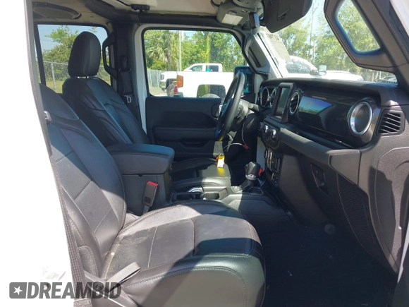 2020 Jeep Wrangler Unlimited Sahara with VIN 1C4HJXEN4LW330867, listed as a IAAI auction lot 41790709 with 63,151 mi miles. Bid and sale history available at carsss.com. Image 5.