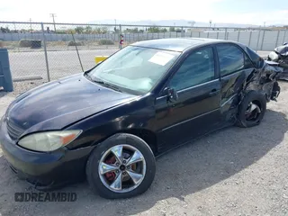 2003 Toyota Camry LE with VIN JTDBF32K730110278, listed as a IAAI auction lot 42033321 with 287,996 mi miles. Bid and sale history available at carsss.com. Image 2.