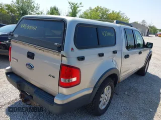 2007 Ford Explorer Sport Trac XLT z VIN 1FMEU51K37UB56300, wystawiony jako IAAI lot #42800061 z przebiegiem 177 751 mil mil oraz . Historia ofert i sprzedaży dostępna na DreamBid. Obrazek 4.