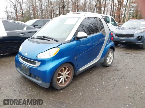 2009 Smart fortwo Passion z VIN WMEEK31X39K225478, wystawiony jako IAAI lot #41510522 z przebiegiem Nie podano mil oraz . Historia ofert i sprzedaży dostępna na DreamBid. Obrazek 2.
