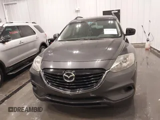 2015 Mazda CX-9 Sport with VIN JM3TB2BA1F0453620, listed as a IAAI auction lot 41330887 with 119,219 mi miles and . Bid and sale history available at carsss.com. Image 12.