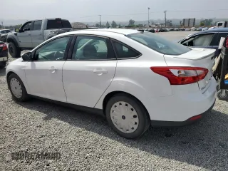 2013 Ford Focus SE z VIN 1FADP3F29DL374088, wystawiony jako Copart lot #59585135 z przebiegiem 74 997 mil mil oraz Szkoda całkowita • Salvage title. Historia ofert i sprzedaży dostępna na DreamBid. Obrazek 2.