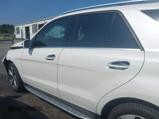2016 Mercedes-Benz GLE 350 z VIN 4JGDA5JB9GA763209, wystawiony jako IAAI lot #42605541 z przebiegiem 75 461 mil mil oraz . Historia ofert i sprzedaży dostępna na DreamBid. Obrazek 14.
