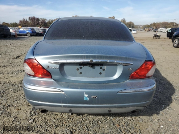 2002 Jaguar X-Type with VIN SAJEA51C62WC50078, listed as a Copart auction lot 78474784 with 144,780 mi miles and Salvage Title. Bid and sale history available at carsss.com. Image 6.