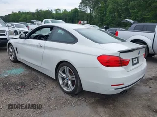 2014 BMW 4 Series 428i z VIN WBA3N3C5XEF711746, wystawiony jako IAAI lot #42215565 z przebiegiem 113 941 mil mil oraz . Historia ofert i sprzedaży dostępna na DreamBid. Obrazek 3.