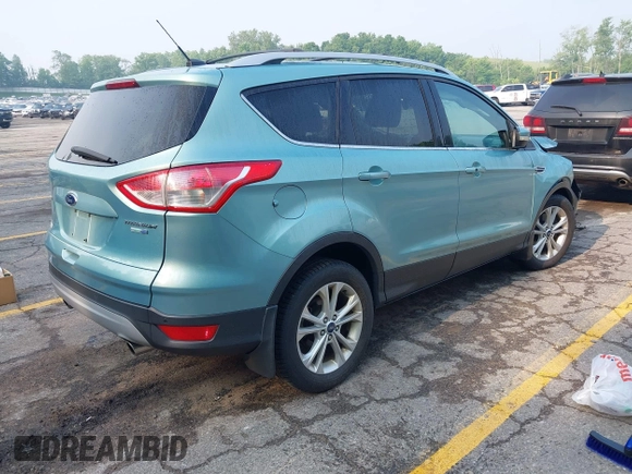 2013 Ford Escape Titanium with VIN 1FMCU9J99DUD63037, listed as a IAAI auction lot 42436605 with 168,200 mi miles and . Bid and sale history available at DreamBid. Image 4.