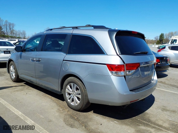 2016 Honda Odyssey SE with VIN 5FNRL5H38GB109733, listed as a IAAI auction lot 41882527 with 123,087 mi miles. Bid and sale history available at carsss.com. Image 3.