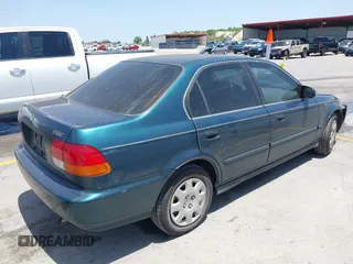 1998 Honda Civic LX z VIN 1HGEJ6671WL011642, wystawiony jako IAAI lot #42308904 z przebiegiem 77 380 mil mil oraz . Historia ofert i sprzedaży dostępna na DreamBid. Obrazek 4.