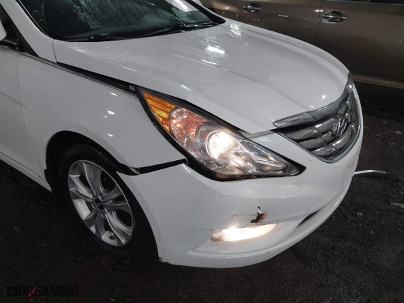 2013 Hyundai Sonata SE with VIN 5NPEC4AC0DH599584, listed as a IAAI auction lot 41961659 with 122,296 mi miles. Bid and sale history available at carsss.com. Image 6.