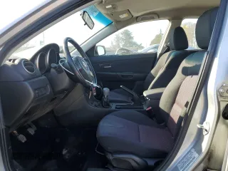 2005 Mazda 3 s with VIN JM1BK143051292702, listed as a Copart auction lot 50704945 with 250,503 mi miles and Salvage Title. Bid and sale history available at carsss.com. Image 7.