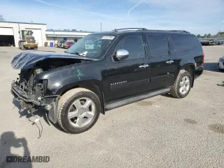 2012 Chevrolet Suburban LT with VIN 1GNSKJE74CR216133, listed as a Copart auction lot 47187385 with 199,922 mi miles and Salvage Title. Bid and sale history available at carsss.com. Image 1.
