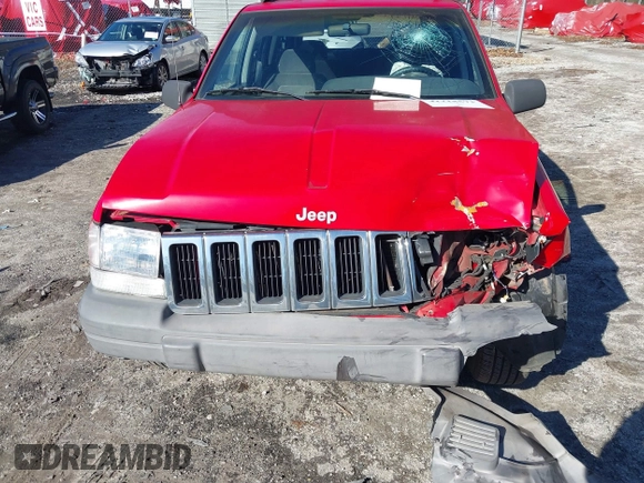 1996 Jeep Grand Cherokee Laredo with VIN 1J4EX58S8TC122302, listed as a IAAI auction lot 41218573 with 195,392 mi miles. Bid and sale history available at carsss.com. Image 12.