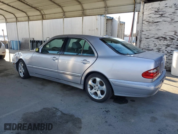 2002 Mercedes-Benz E-Class with VIN WDBJF65J12B488632, listed as a Copart auction lot 87060504 with 273,135 mi miles and Salvage Title. Bid and sale history available at carsss.com. Image 2.