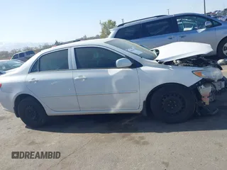 2010 Toyota Corolla with VIN 1NXBU4EE5AZ340601, listed as a IAAI auction lot 42003025 with 68,121 mi miles. Bid and sale history available at carsss.com. Image 14.