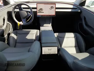 2025 Tesla Model 3 Long Range z VIN 5YJ3E1EA8SF903460, wystawiony jako Copart lot #57116545 z przebiegiem 5 147 mil mil oraz Szkoda całkowita • Salvage title. Historia ofert i sprzedaży dostępna na DreamBid. Obrazek 8.