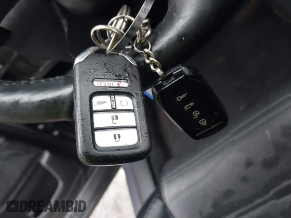 2020 Honda CR-V EX-L with VIN 7FART6H8XLE011609, listed as a IAAI auction lot 41573897 with 95,966 mi miles and . Bid and sale history available at DreamBid. Image 11.