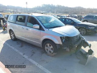2010 Dodge Grand Caravan SXT with VIN 2D4RN5D17AR154594, listed as a IAAI auction lot 41751767 with Not Provided miles and . Bid and sale history available at DreamBid. Image 1.