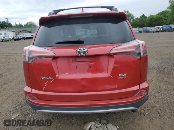 2016 Toyota RAV4 XLE with VIN 2T3RFREVXGW434477, listed as a Copart auction lot 62471185 with 116,779 mi miles and Salvage title. Bid and sale history available at DreamBid. Image 6.