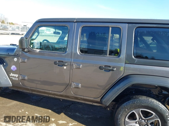 2019 Jeep Wrangler Unlimited Sport S with VIN 1C4HJXDG5KW505015, listed as a IAAI auction lot 41560088 with 54,193 mi miles and . Bid and sale history available at DreamBid. Image 14.