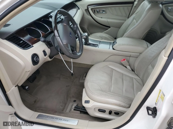 2011 Ford Taurus Limited with VIN 1FAHP2FW4BG135598, listed as a Copart auction lot 82765294 with 136075 miles and Salvage Title. Bid and sale history available at carsss.com. Image 7.