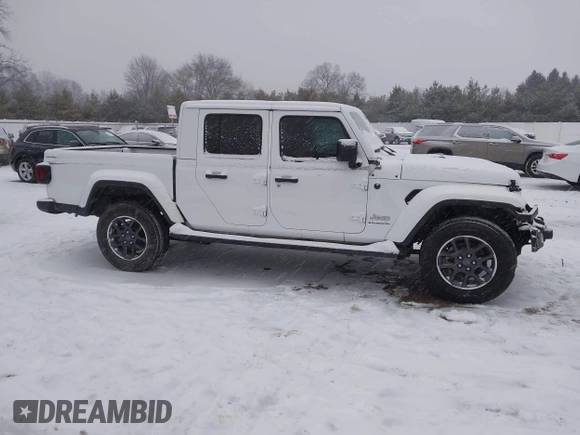 2023 Jeep Gladiator Overland z VIN 1C6HJTFG6PL544489, wystawiony jako IAAI lot #41311654 z przebiegiem 37 630 mil mil oraz . Historia ofert i sprzedaży dostępna na DreamBid. Obrazek 13.