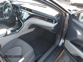 2020 Toyota Camry LE with VIN 4T1C11AKXLU884764, listed as a IAAI auction lot 40821088 with 111,631 mi miles. Bid and sale history available at carsss.com. Image 5.