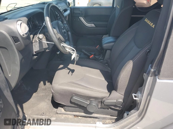 2015 Jeep Wrangler Sahara with VIN 1C4AJWBG1FL705900, listed as a Copart auction lot 62353275 with 64,866 mi miles and Salvage title. Bid and sale history available at DreamBid. Image 7.