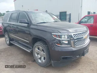 2018 Chevrolet Tahoe LT with VIN 1GNSKBKC2JR287349, listed as a IAAI auction lot 42661433 with 156,216 mi miles and . Bid and sale history available at DreamBid. Image 1.