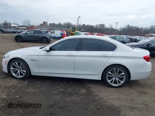 2014 BMW 5 Series 535i xDrive with VIN WBA5B3C57ED537549, listed as a IAAI auction lot 41047583 with 69,005 mi miles and . Bid and sale history available at carsss.com. Image 14.