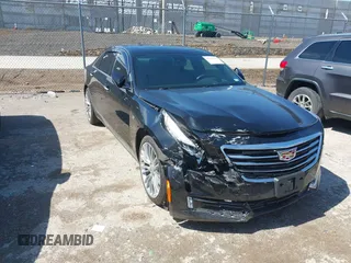 2018 Cadillac CT6 Premium Luxury AWD z VIN 1G6KJ5R63JU143208, wystawiony jako IAAI lot #42425202 z przebiegiem 92 389 mil mil oraz . Historia ofert i sprzedaży dostępna na DreamBid. Obrazek 1.