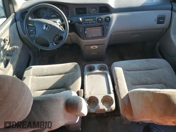 2003 Honda Odyssey EX z VIN 5FNRL18673B014271, wystawiony jako Copart lot #68613374 z przebiegiem 236 360 mil mil oraz Nie do naprawy • Non repairable. Historia ofert i sprzedaży dostępna na DreamBid. Obrazek 8.