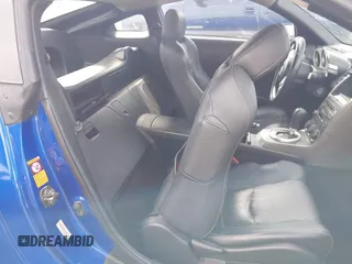2003 Nissan 350Z Touring with VIN JN1AZ34E23T012447, listed as a IAAI auction lot 41994211 with 180,402 mi miles and . Bid and sale history available at DreamBid. Image 8.