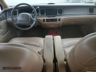 1997 Lincoln Town Car Signature with VIN 1LNLM82W2VY697709, listed as a Copart auction lot 70506934 with 200,288 mi miles and Salvage Title. Bid and sale history available at carsss.com. Image 8.