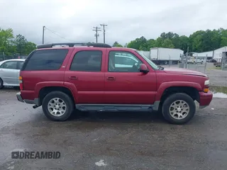 2006 Chevrolet Tahoe LT z VIN 1GNEC13Z66R158948, wystawiony jako IAAI lot #42252434 z przebiegiem 278 512 mil mil oraz . Historia ofert i sprzedaży dostępna na DreamBid. Obrazek 13.
