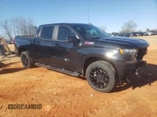 2021 Chevrolet Silverado 1500 RST with VIN 1GCUYEET7MZ394429, listed as a Copart auction lot 41512345 with 50,723 mi miles and Salvage Title. Bid and sale history available at carsss.com. Image 4.
