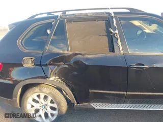 2011 BMW X5 35i with VIN 5UXZV4C54BL402935, listed as a IAAI auction lot 41198827 with 120,157 mi miles. Bid and sale history available at carsss.com. Image 6.