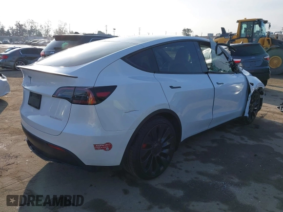 2023 Tesla Model Y Performance with VIN 7SAYGDEF0PF839468, listed as a IAAI auction lot 41609263 with 25,434 mi miles and . Bid and sale history available at DreamBid. Image 4.