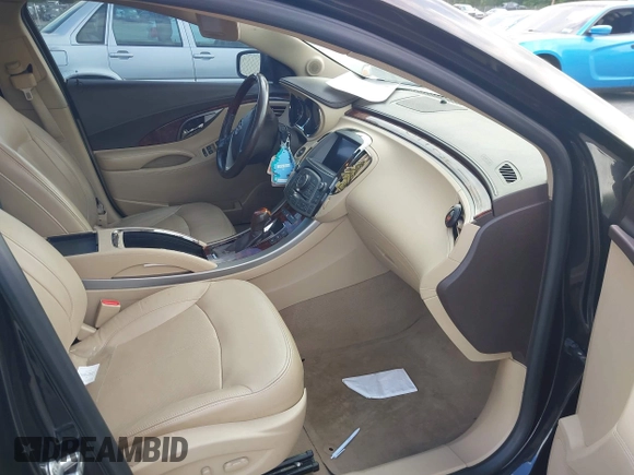 2013 Buick LaCrosse Touring with VIN 1G4GJ5E32DF215583, listed as a IAAI auction lot 42125132 with 118,602 mi miles and . Bid and sale history available at DreamBid. Image 5.