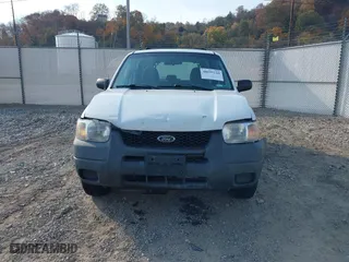 2003 Ford Escape XLS Popular with VIN 1FMYU92183KB46619, listed as a IAAI auction lot 40695244 with 0 mi miles. Bid and sale history available at carsss.com. Image 6.