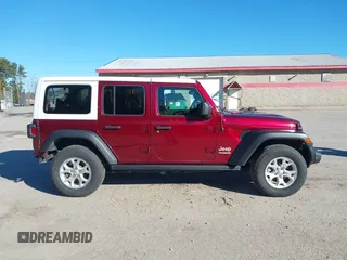 2021 Jeep Wrangler Unlimited Sport S z VIN 1C4HJXDG4MW647164, wystawiony jako IAAI lot #40952672 z przebiegiem 51 366 mil mil oraz . Historia ofert i sprzedaży dostępna na DreamBid. Obrazek 14.