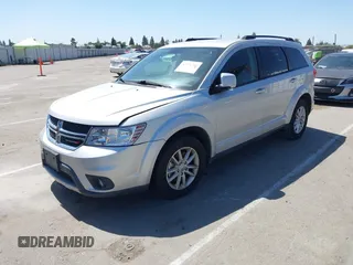 2014 Dodge Journey SXT z VIN 3C4PDDBG8ET212188, wystawiony jako IAAI lot #42101266 z przebiegiem 101 553 mil mil oraz . Historia ofert i sprzedaży dostępna na DreamBid. Obrazek 2.